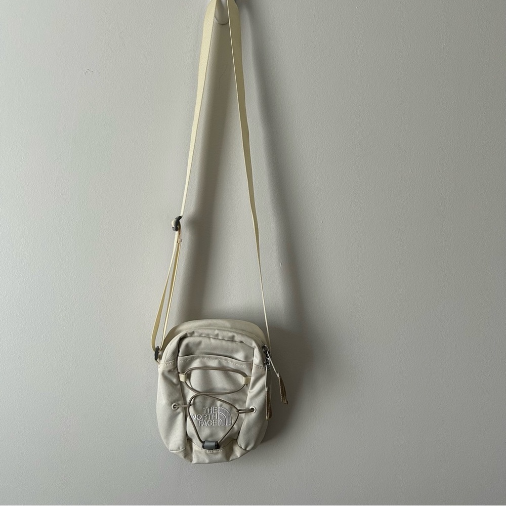 The North Face Jester Cream Crossbody Bag with Adjustable Strap